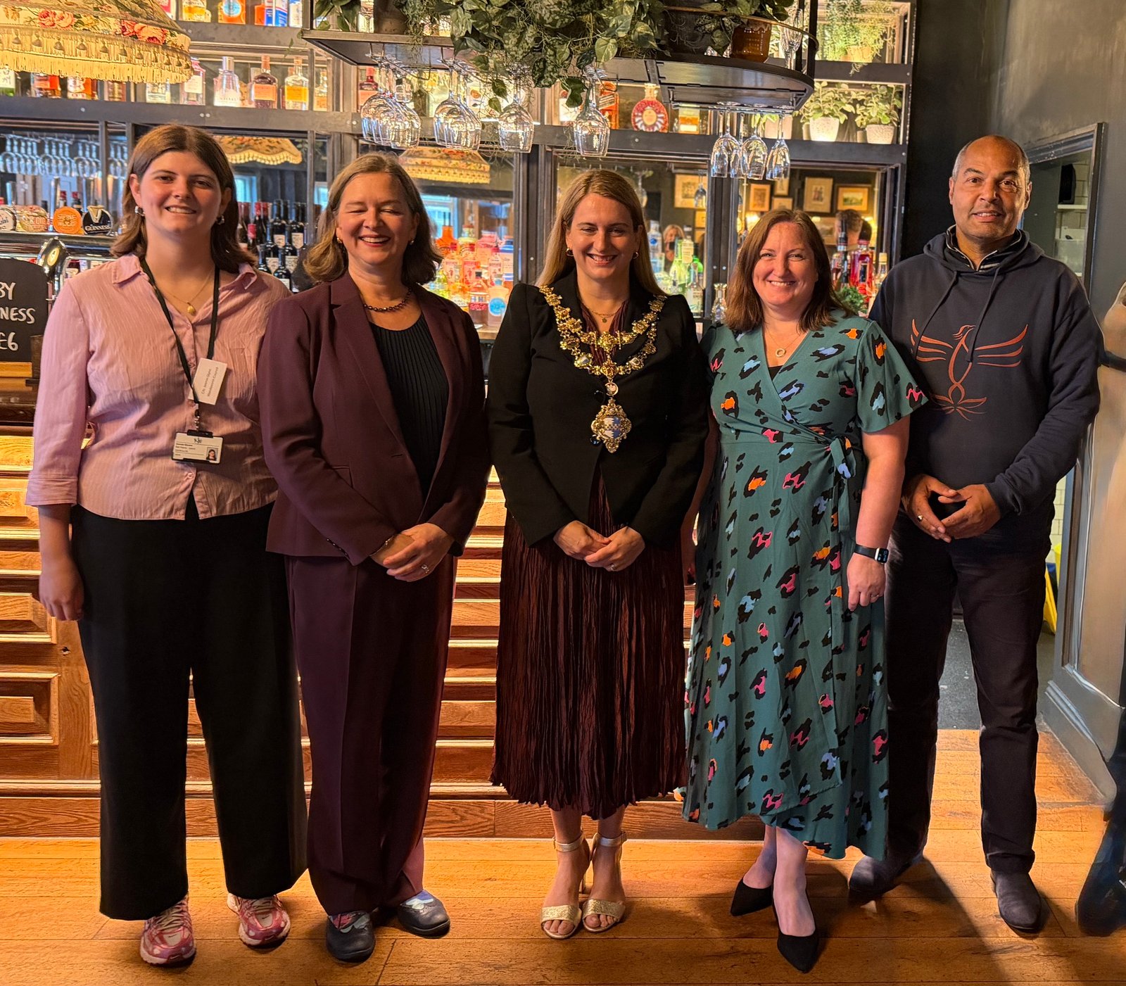 Phoenix Yoga representatives at a local community event